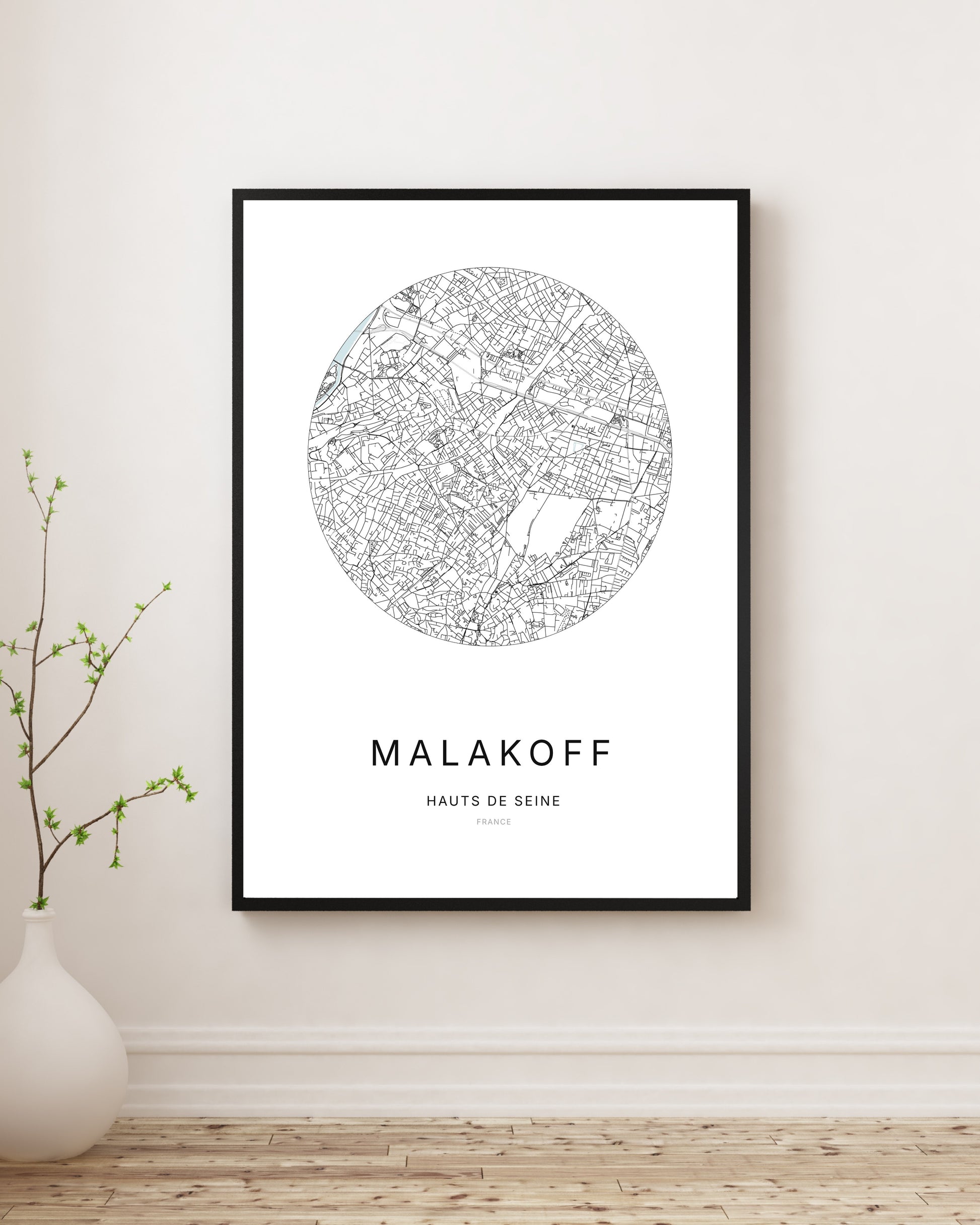 Affiche plan de ville minimaliste de Malakoff encadrée en noir.