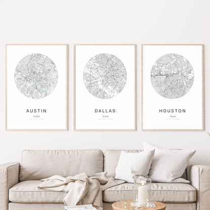 Trio d’affiches d’Austin, Dallas et Houston dans un salon.