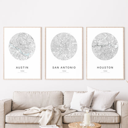 Trio d’affiches d’Austin, San Antonio et Houston dans un salon.