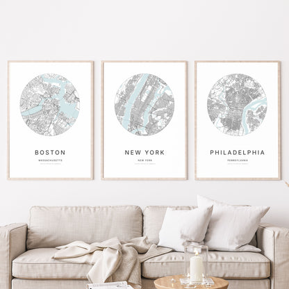 Trio d’affiches de Boston, New York et Philadelphie dans un salon.