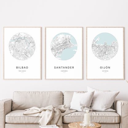 Trio d'affiches de Santander, Bilbao et Gijón dans un salon.