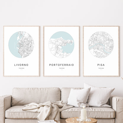 Trio di poster di Portoferraio, Livorno e Pisa in un soggiorno.