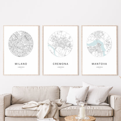 Trio d'affiches de Cremona, Milano et Mantova dans un salon.