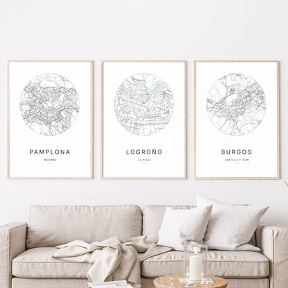 Trio d'affiches de Logroño, Pamplona et Burgos dans un salon.
