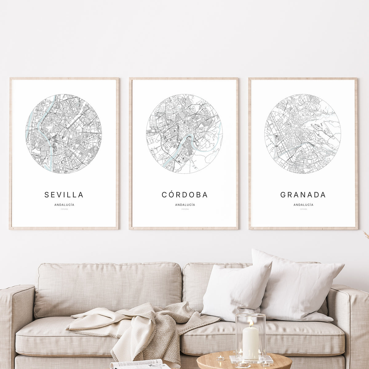 Trio of Córdoba, Sevilla and Toledo city map prints in a living room.