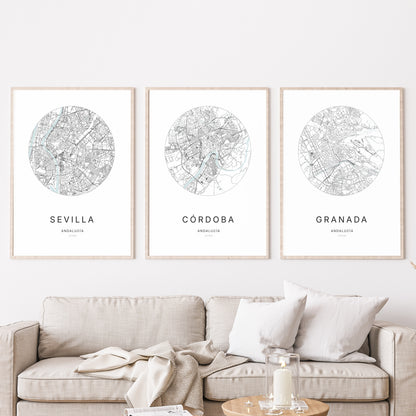 Trio of Córdoba, Sevilla and Toledo city map prints in a living room.