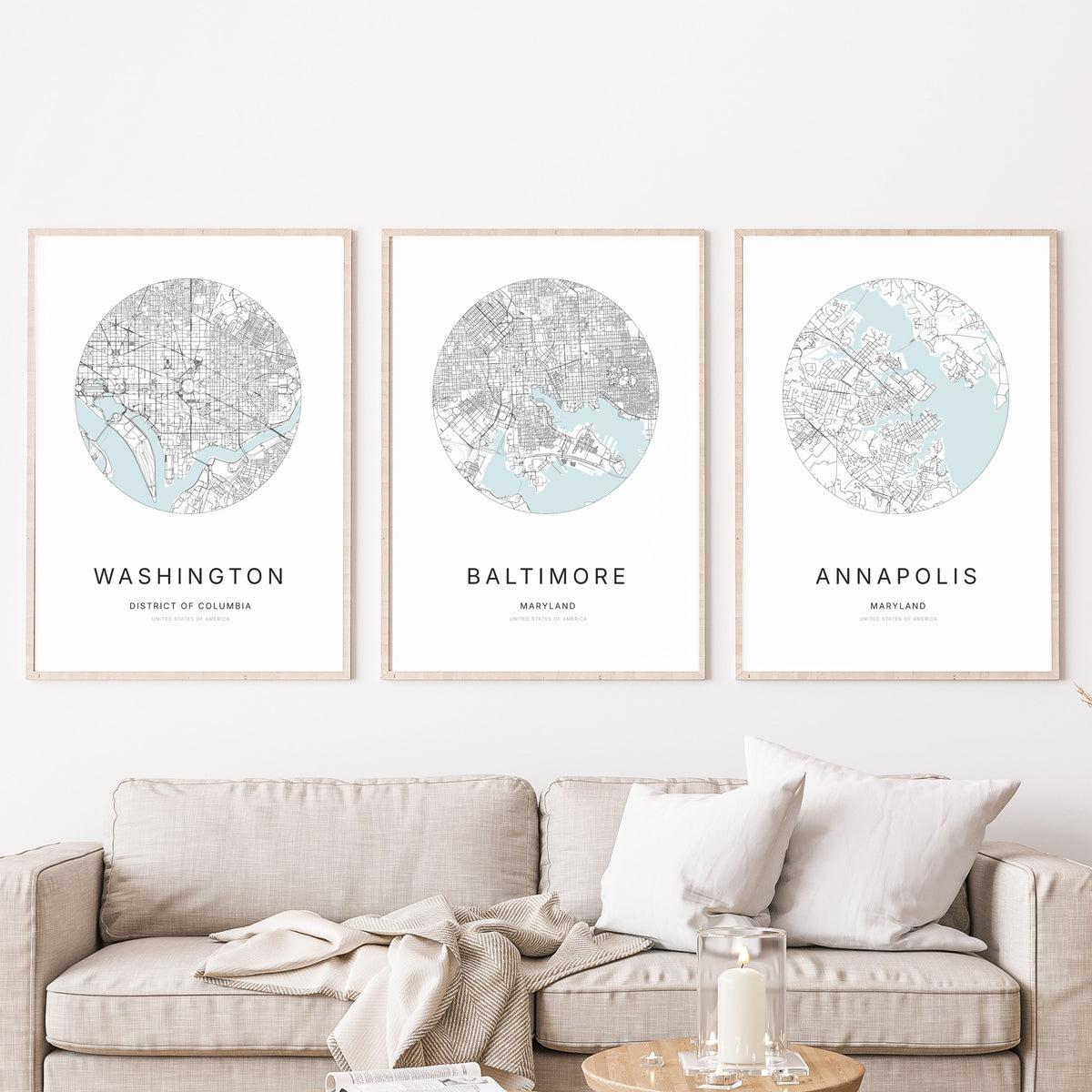 Trio of Washington, DC, Baltimore and Annapolis city map posters in a living room.