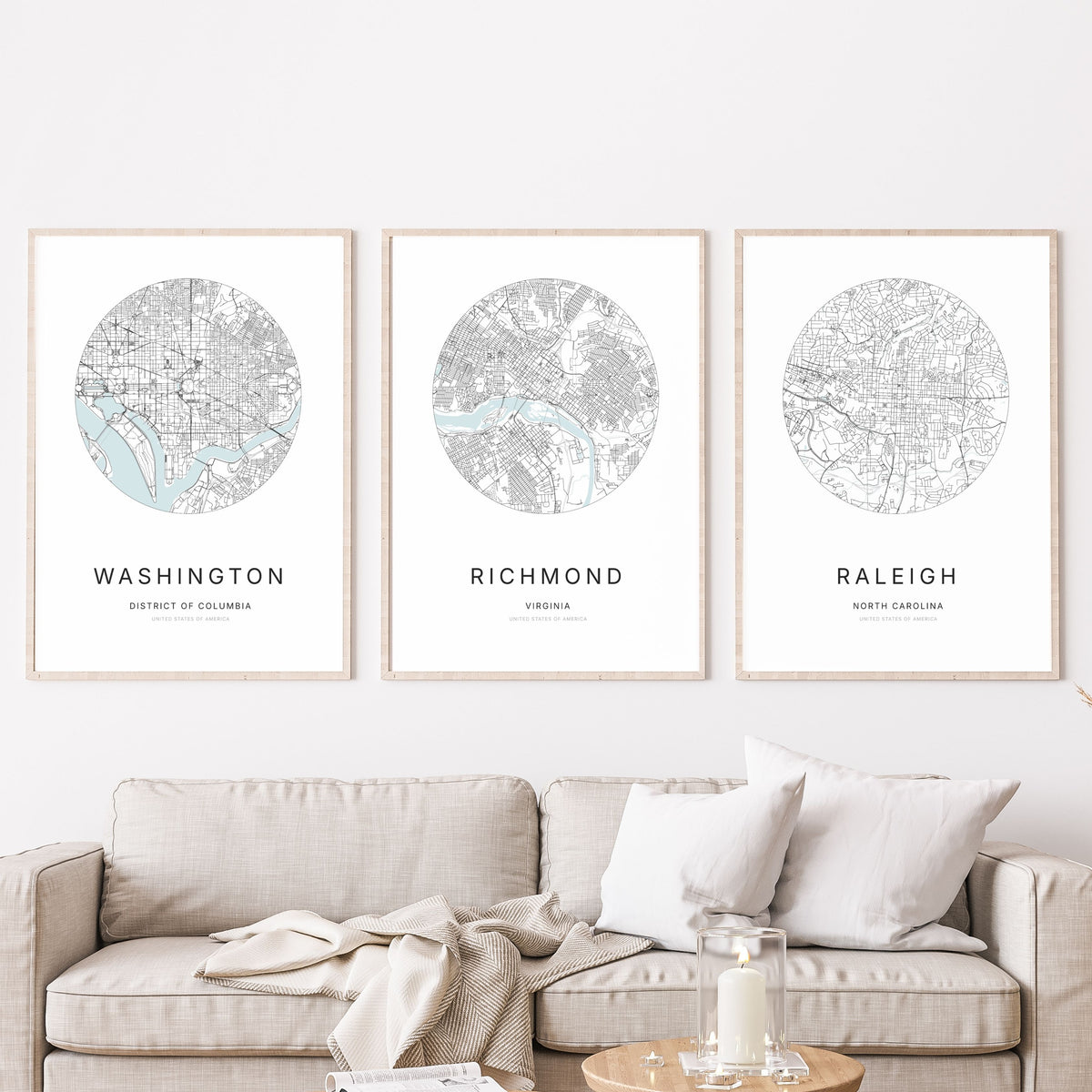 Trio of Washington, DC, Richmond and Raleigh city map posters in a living room.